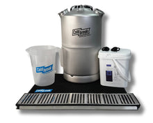 Brewing equipment set with a large silver tank, smaller white container, and measuring cup on a white background. Jockey box pour more holiday bundle
